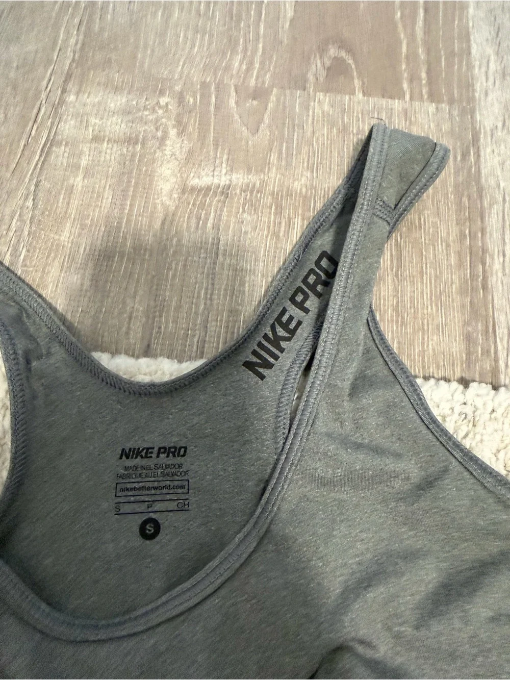 Nike Women's Gray Sports Tank Top with Black Swoosh